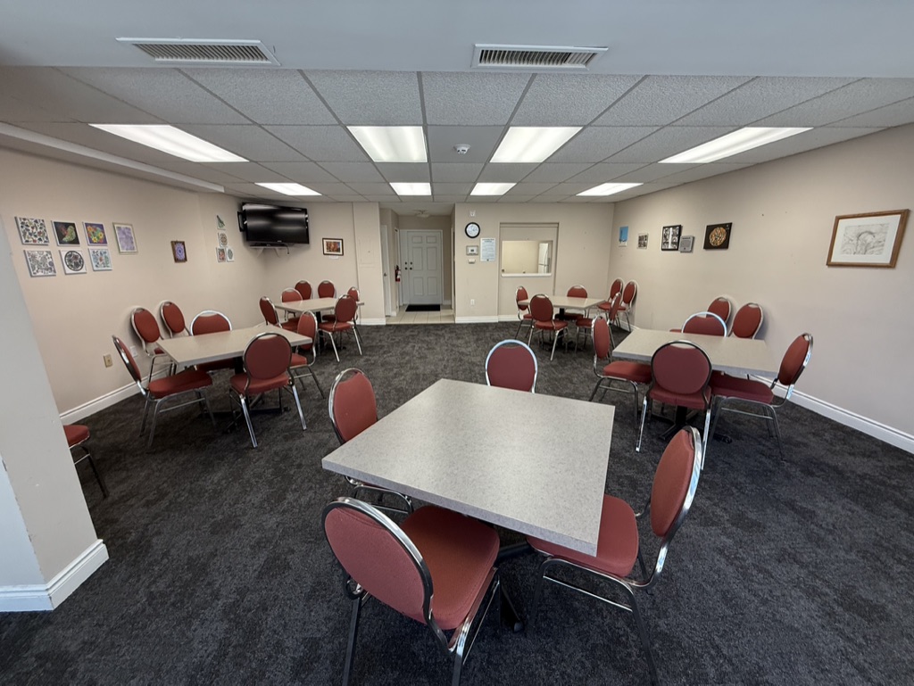 A metal mailbox with a "Tenant Resosack Form" form peeking out.